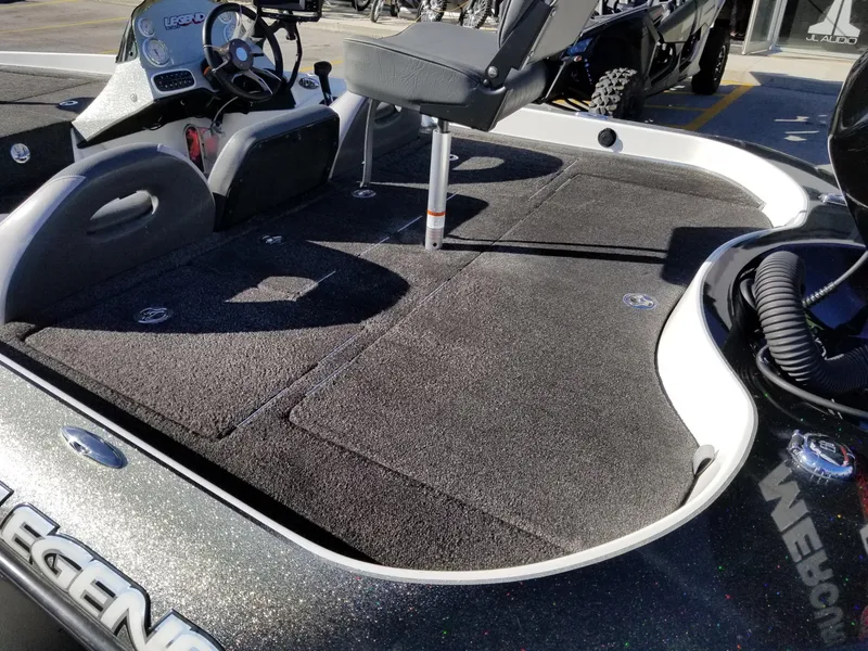 Slide: The Image of 2014 Legend Boats ALPHA 191 SCX interior with seating and steering console. - 6