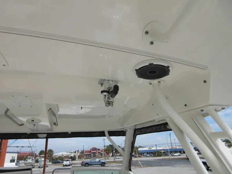 Slide: The Image of 2021 Boston Whaler 280 Vantage boat interior ceiling with speaker and light fixtures. - 11