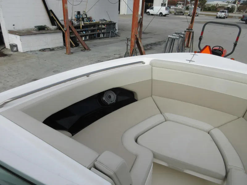 Slide: The Image of 2021 Boston Whaler 280 Vantage boat with beige seating and speaker system. - 14