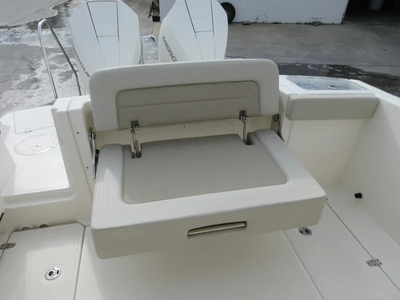 Slide: The Image of 2021 Boston Whaler 280 Vantage boat with foldable rear seat. - 21