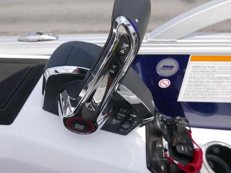 Slide: The Image of 2024 Barletta Corsa 23UC throttle control with start button and safety features. - 21