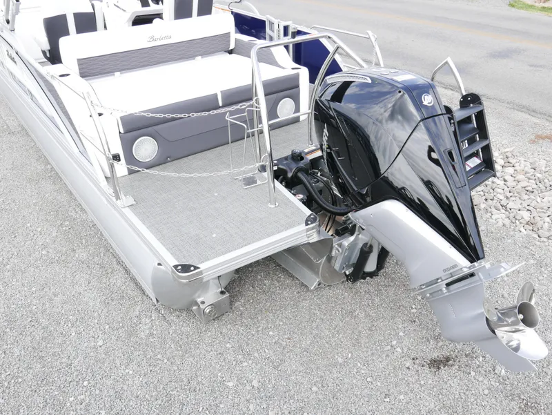 Slide: The Image of 2024 Barletta Corsa 23UC pontoon boat with powerful outboard motor, rear view. - 3