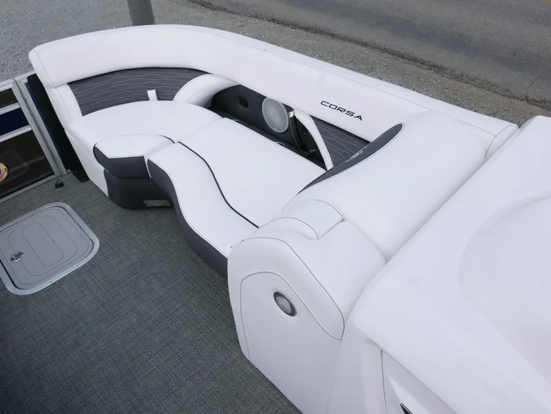 Slide: The Image of 2024 Barletta Corsa 23UC boat interior with white seating and modern design. - 7