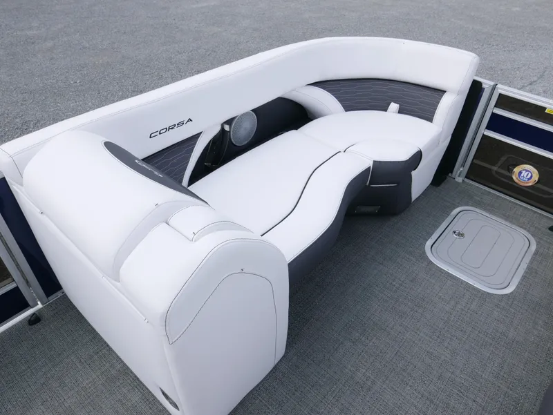 Slide: The Image of 2024 Barletta Corsa 23UC boat interior with sleek white seating and modern design. - 8