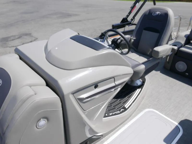 Slide: The Image of 2024 Barletta Corsa 23UC boat interior with sleek helm and comfortable seating. - 16