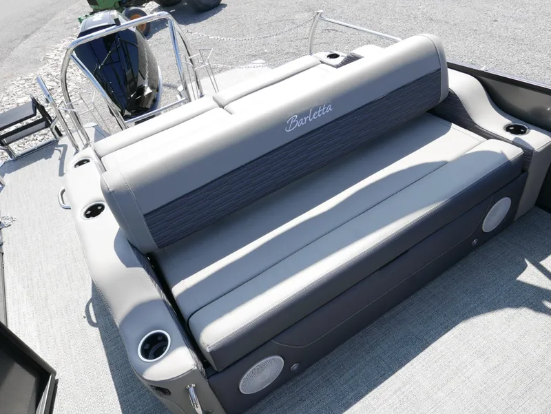 Slide: The Image of 2024 Barletta Corsa 23UC boat seating with gray upholstery and cup holders. - 22