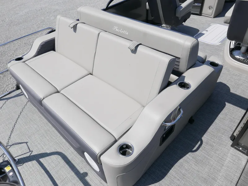 Slide: The Image of 2024 Barletta Corsa 23UC boat seating with cup holders and sleek design. - 24
