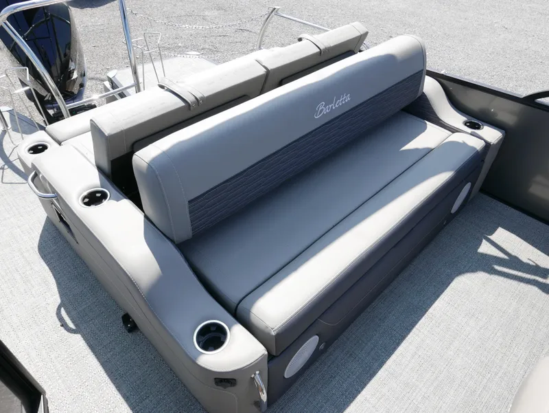 Slide: The Image of 2024 Barletta Corsa 23UC boat with luxurious gray seating and cup holders. - 25