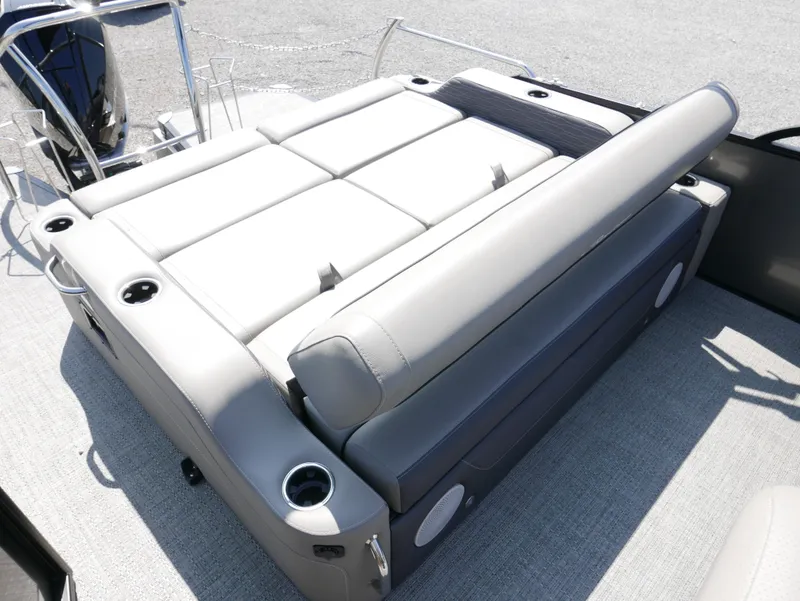 Slide: The Image of 2024 Barletta Corsa 23UC boat interior with gray seating and cup holders. - 28