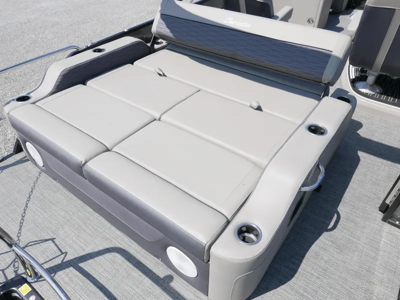 Slide: The Image of 2024 Barletta Corsa 23UC boat seating with cup holders and sleek design. - 7