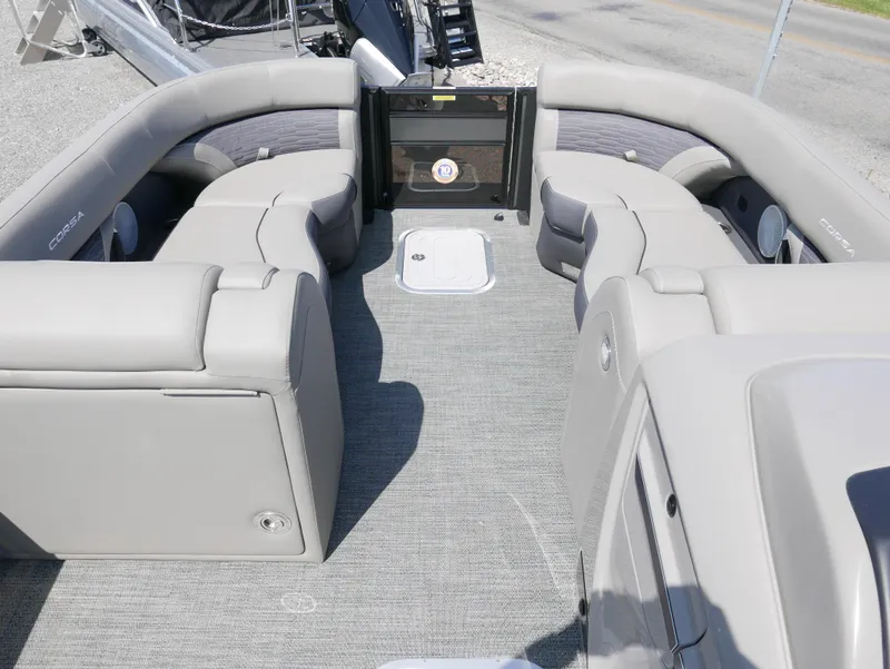 Slide: The Image of 2024 Barletta Corsa 23UC pontoon boat interior with plush seating and modern design. - 9