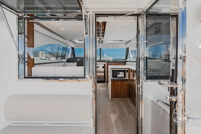 Slide: The Image of Interior view of 2026 Riviera 395 SUV yacht, featuring modern design and luxurious amenities. - 22