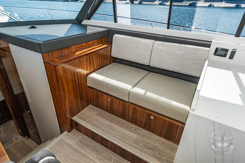 Slide: The Image of Interior of 2026 Riviera 395 SUV with elegant wood finish and comfortable seating. - 31