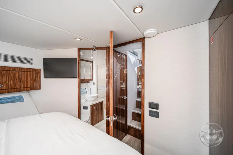 Slide: The Image of Luxurious interior of 2026 Riviera 395 SUV yacht with modern amenities and elegant design. - 34