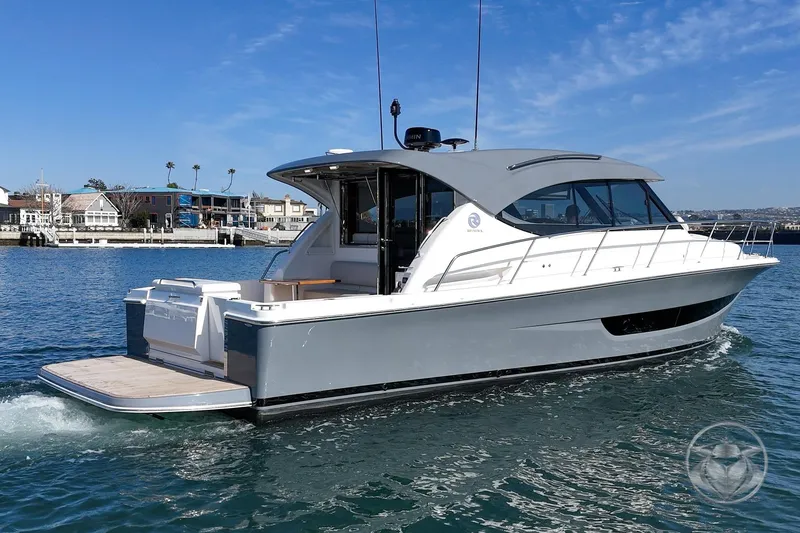 Slide: The Image of 2026 Riviera 395 SUV cruising on water, showcasing sleek design and modern features. - 5