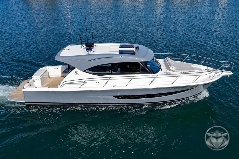 Slide: The Image of 2026 Riviera 395 SUV cruising on clear blue water. - 6