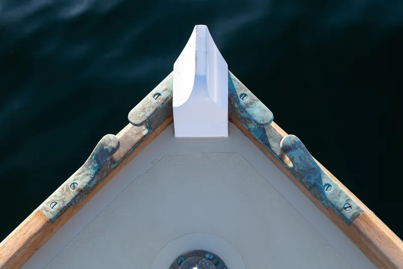 Slide: The Image of Bow of 2021 Center Console East Passage 24 boat on water. - 14