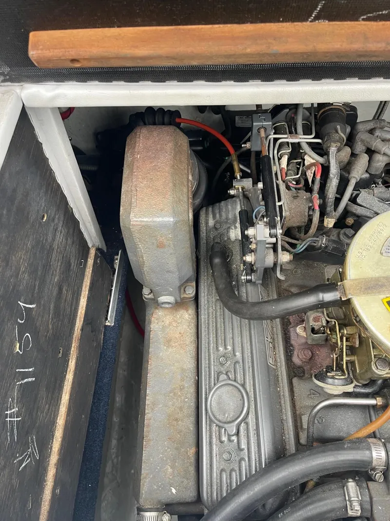Slide: The Image of 1988 Regal engine compartment with visible components and wiring. - 18