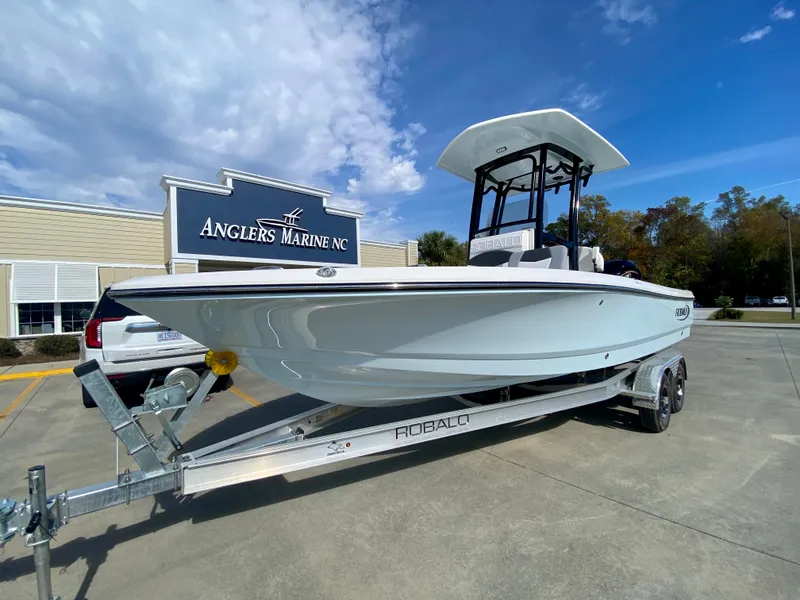 Slide: The Image of 2024 Robalo 226 Cayman boat on trailer at Anglers Marine NC dealership. - 5