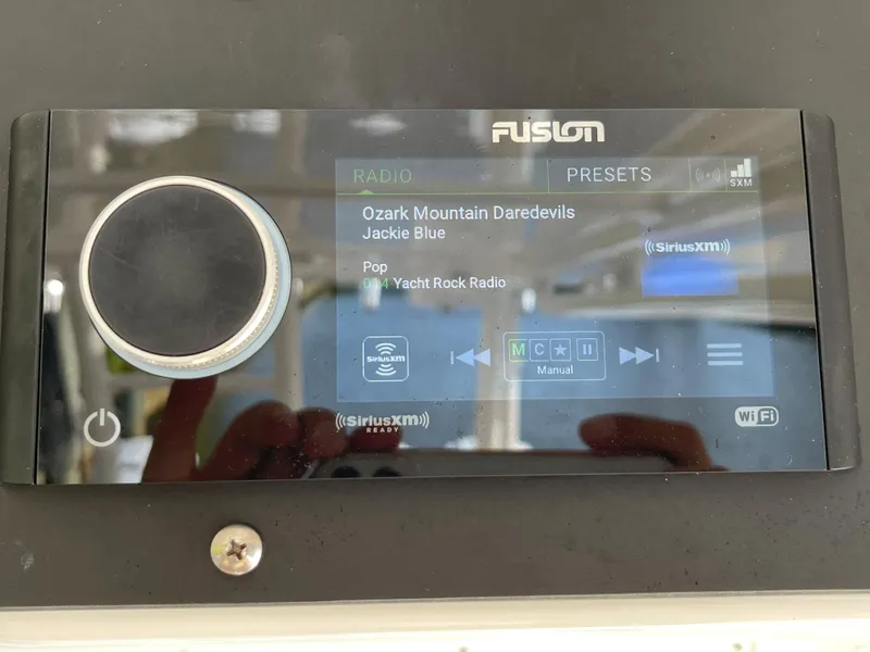 Slide: The Image of Fusion radio display on Everglades 435 CC, playing "Jackie Blue" by Ozark Mountain Daredevils. - 32