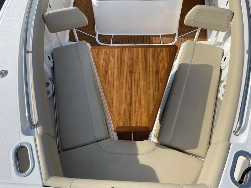 Slide: The Image of Luxurious seating area on 2019 Everglades 435 CC boat with teak flooring. - 45