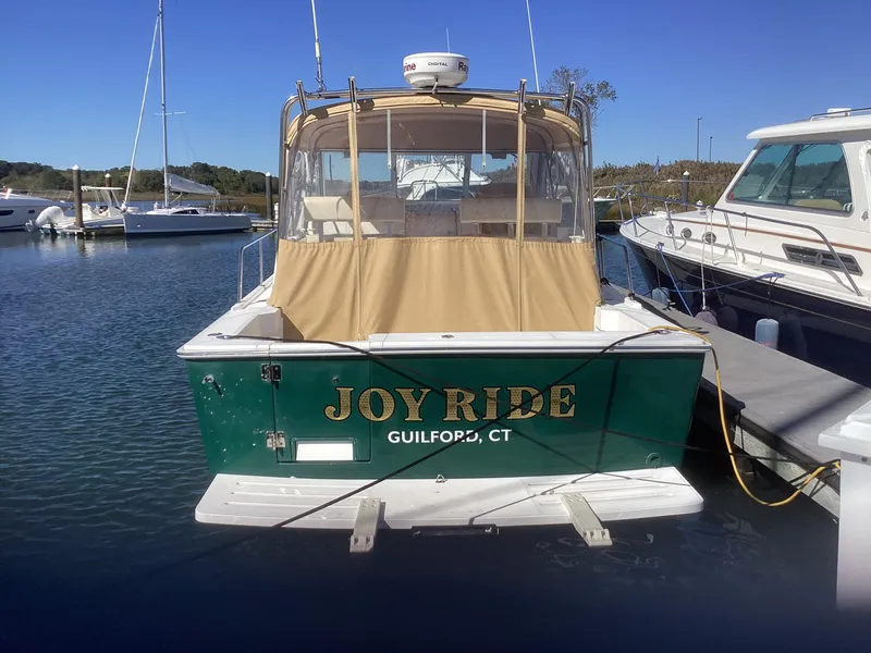 Slide: The Image of 2002 Mainship 34 PILOT boat named "Joyride" docked in Guilford, CT. - 2