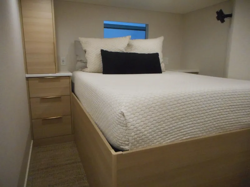 Slide: The Image of Modern bedroom interior in Adonia Radiance Share #12, 2022 model, featuring minimalist design. - 23