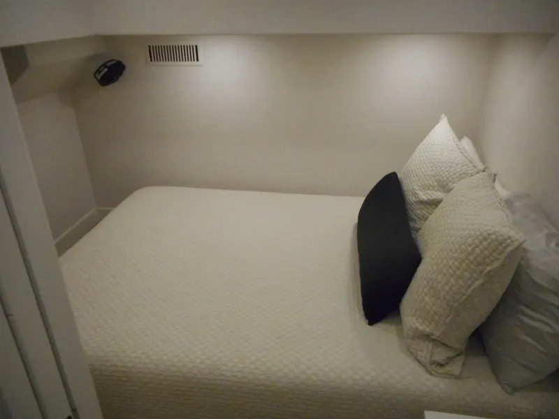 Slide: The Image of Compact bedroom in Adonia Radiance Share #12, 2022 model, featuring cozy bedding and ambient lighting. - 28