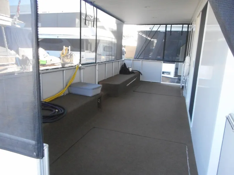 Slide: The Image of Covered deck area of Adonia Radiance Share #12 houseboat, 2022 model. - 3