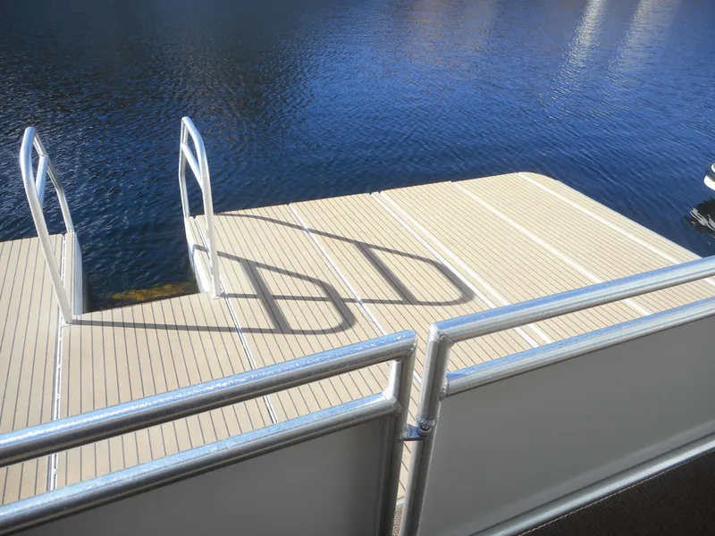 Slide: The Image of Modern dock with metal railings on calm water, Adonia Radiance Share #12, 2022. - 43