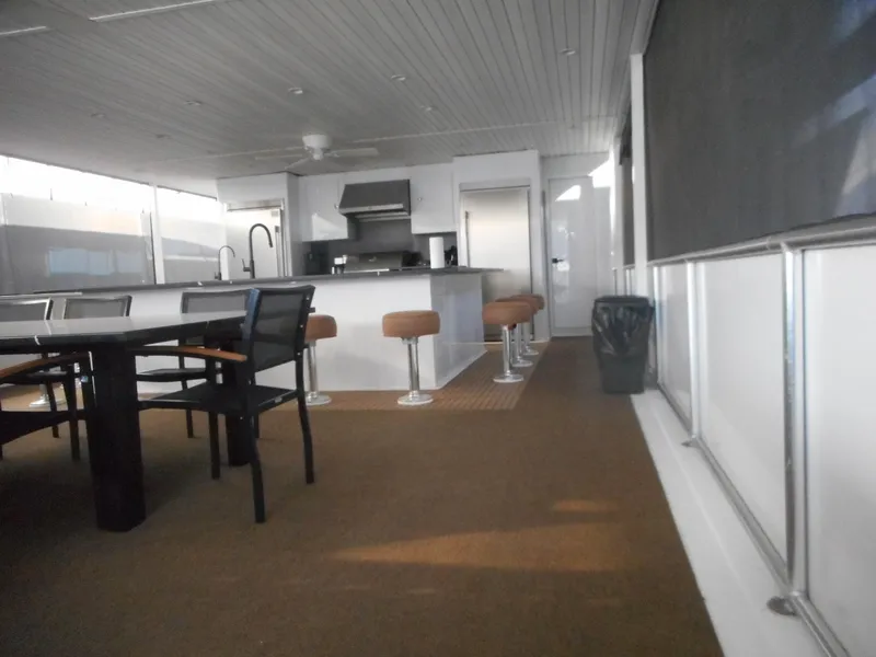 Slide: The Image of Modern kitchen and dining area on Adonia Radiance Share #12 houseboat, 2022 model. - 48