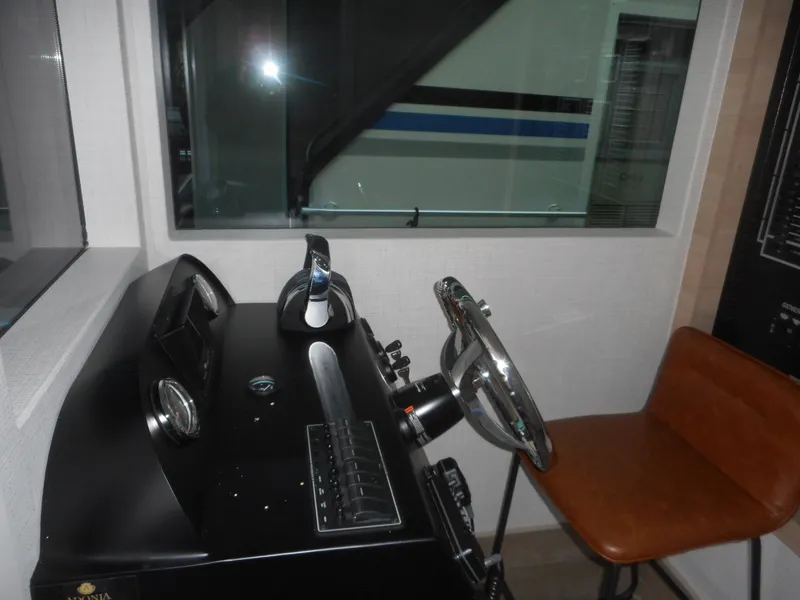 Slide: The Image of Control panel with steering wheel and chair, Adonia Radiance Share #12, 2022 model. - 6