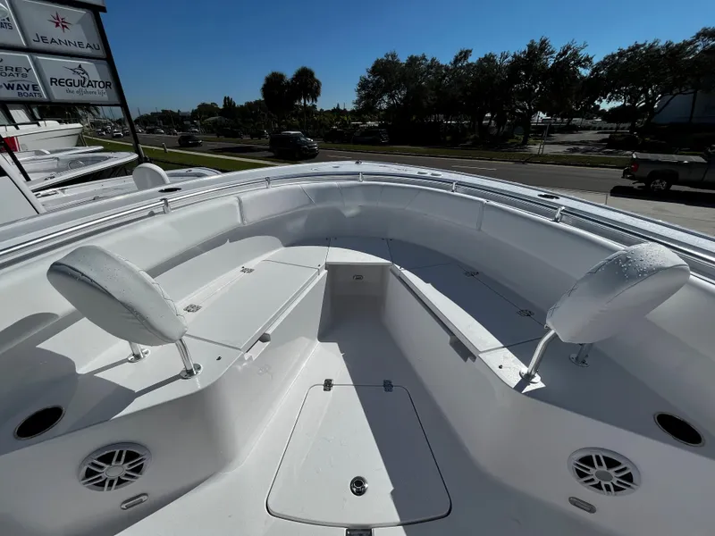 Slide: The Image of 2024 Sportsman Open 252 Center Console boat with spacious seating area. - 17