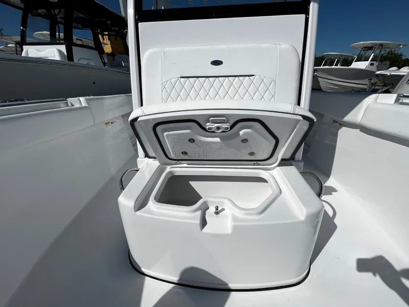 Slide: The Image of 2024 Sportsman Open 252 Center Console boat with open storage compartment. - 18