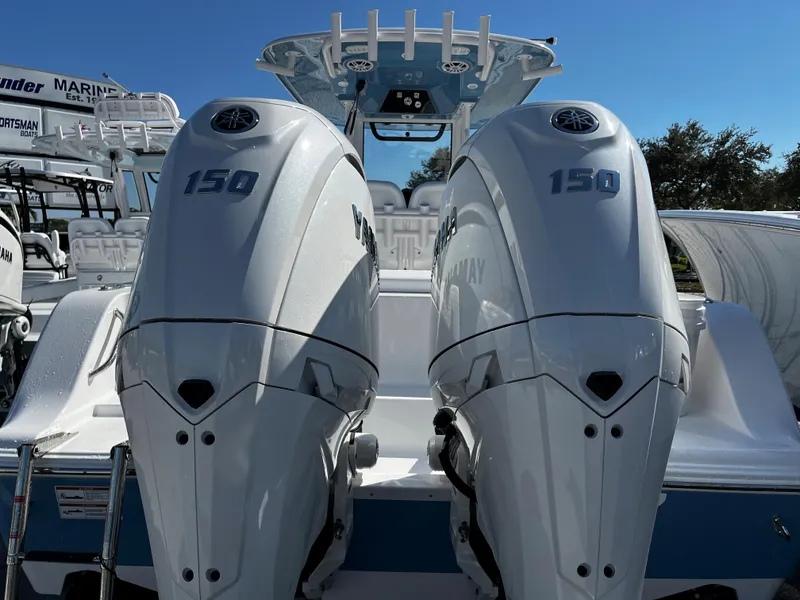 Slide: The Image of 2024 Sportsman Open 252 Center Console with twin 150 horsepower engines. - 4