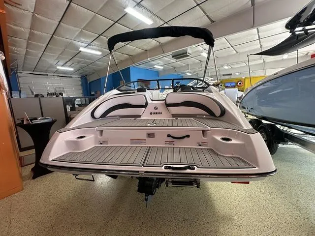 Slide: The Image of 2024 Yamaha Boats SX195 interior cockpit with seating and dashboard. - 4