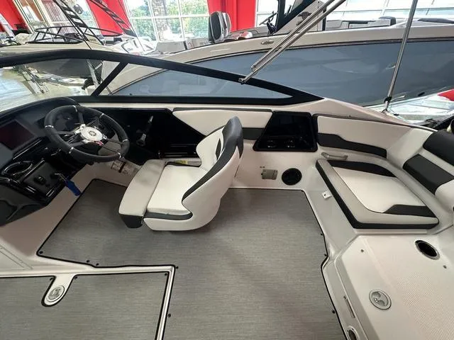 Slide: The Image of 2024 Yamaha Boats SX195 interior view with spacious seating and modern design. - 6