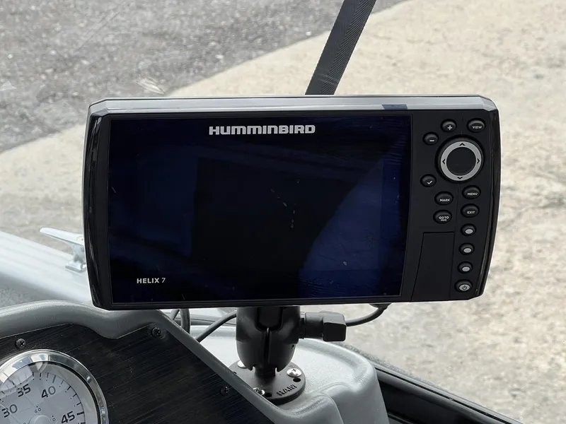 Slide: The Image of Humminbird Helix 7 fish finder on 2024 Starcraft Renegade 168 DC dashboard. - 15