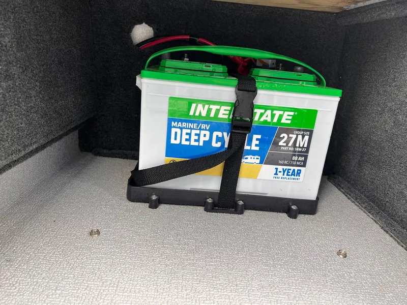 Slide: The Image of Marine deep cycle battery in 2024 Starcraft Renegade 168 DC boat compartment. - 18