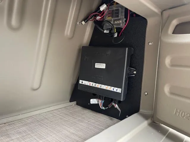 Slide: The Image of Electrical panel inside a 2024 Sun Tracker Fishin' Barge 20 DLX boat. - 16