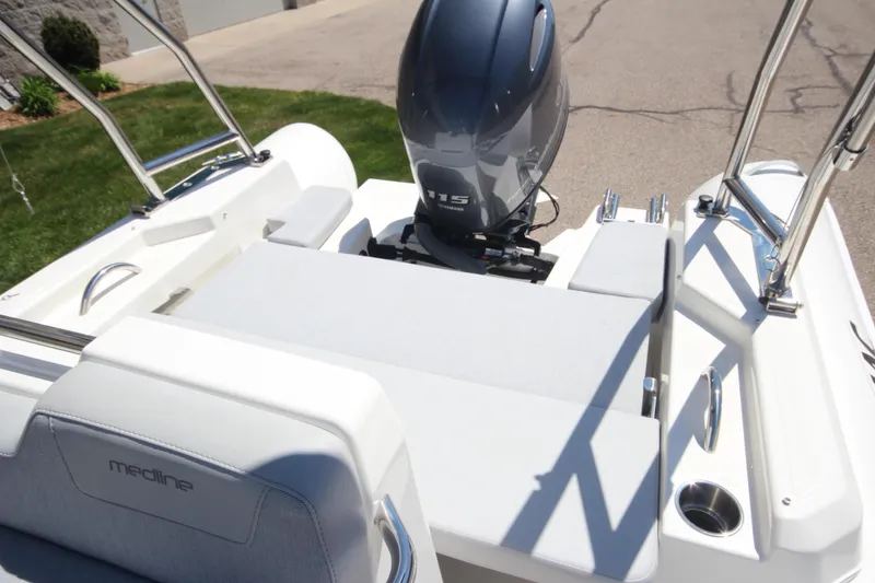 Slide: The Image of 2025 Zodiac Medline 5.8 NEO boat with 115hp engine, rear view. - 11