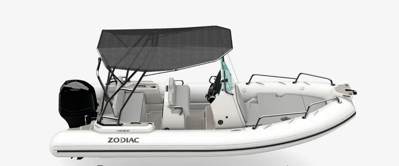 Slide: The Image of 2025 Zodiac Medline 5.8 NEO boat with canopy and outboard motor, side view. - 6