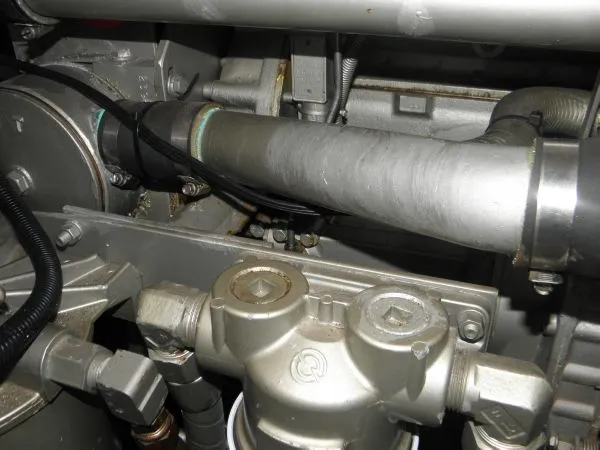 Slide: The Image of Engine components of a 1988 Trojan 12 Meter Convertible boat. - 15