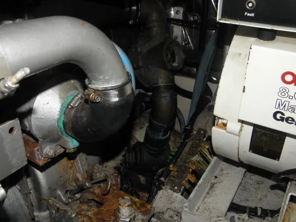 Slide: The Image of Engine compartment of a 1988 Trojan 12 Meter Convertible boat. - 19