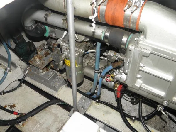 Slide: The Image of Engine compartment of a 1988 Trojan 12 Meter Convertible boat. - 13