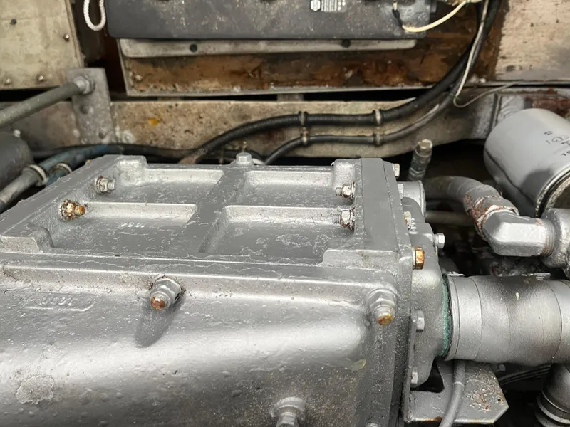 Slide: The Image of Engine compartment of a 1988 Trojan 12 Meter Convertible boat. - 28