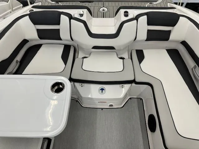 Slide: The Image of 2024 Yamaha Boats SX195 interior with sleek seating and modern design. - 11