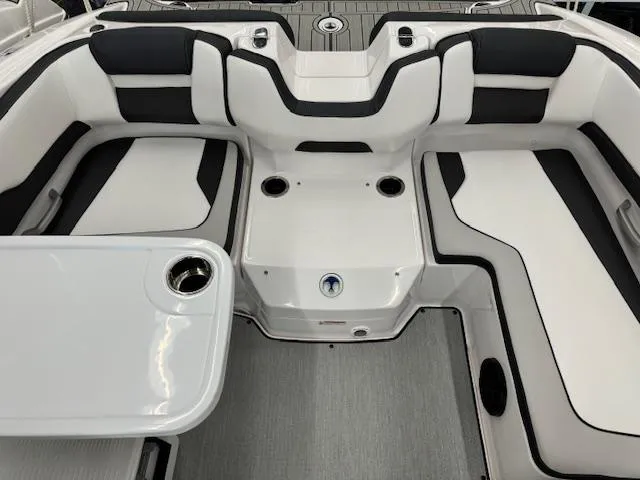 Slide: The Image of 2024 Yamaha Boats SX195 interior with sleek seating and modern design. - 12