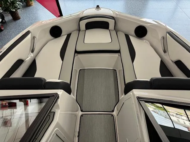 Slide: The Image of 2024 Yamaha Boats SX195 interior with sleek seating and modern design. - 4