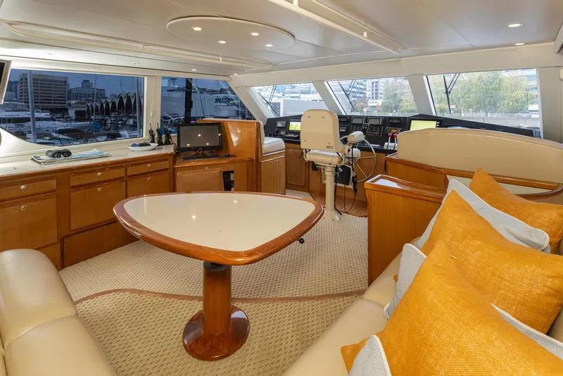 Slide: The Image of Luxurious interior of a 2000 Viking 72 Convertible yacht with modern amenities. - 3